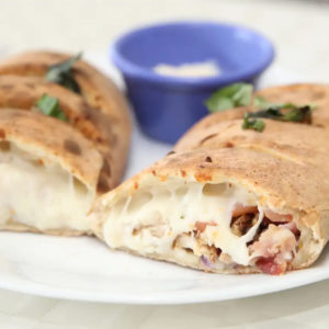 Chicken Strips, Smoked Bacon and Our Premium Cheese blend topped with Fresh Tomatoes, Red Onions and Choice of Alfredo or Mayonnaise